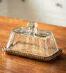 Picture of clear glass butter dish with wooden base